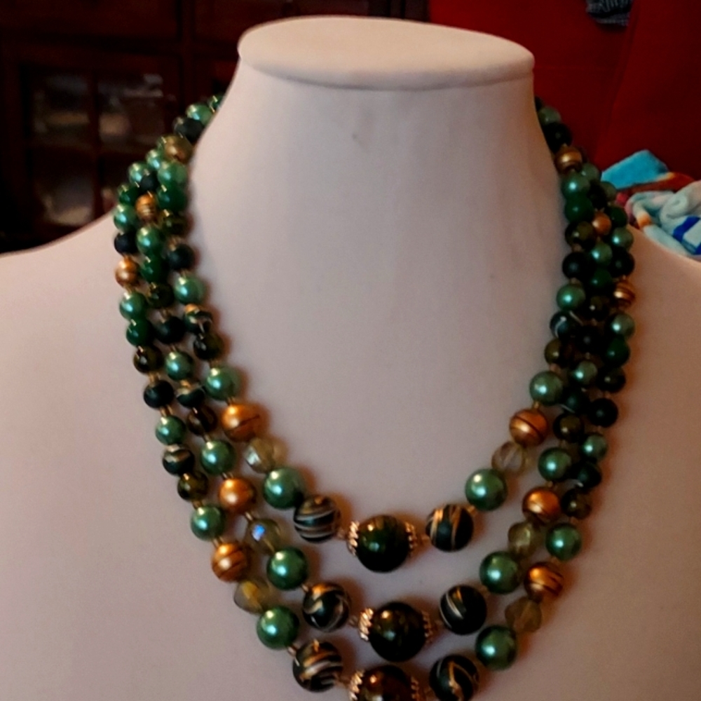 Beautiful vintage  three strand necklace. Made in Japan. Great fall colors mixed